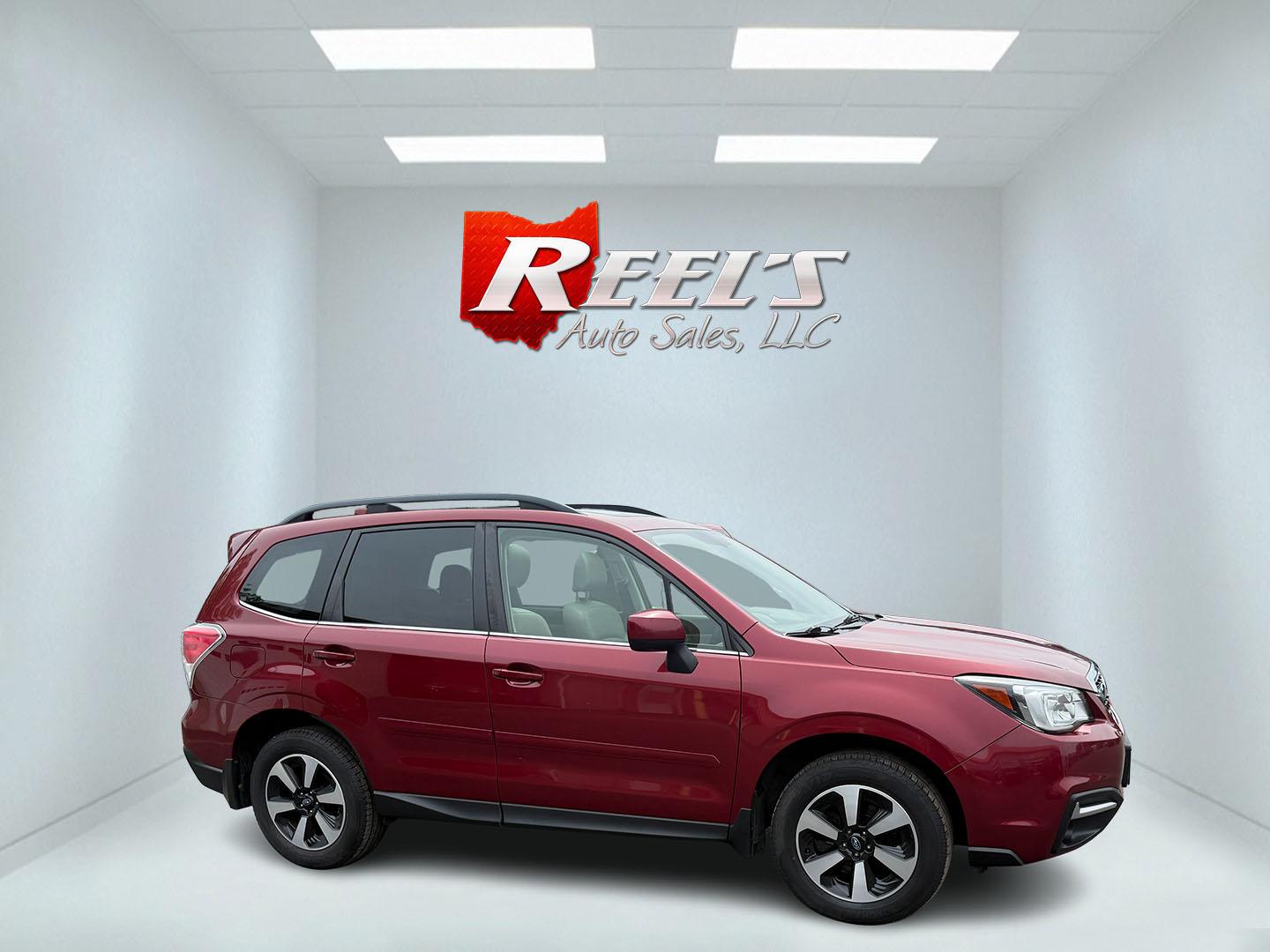 2018 Red /Gray Subaru Forester 2.5i Limited (JF2SJAJC5JH) with an 2.5L H4 DOHC 16V engine, Automatic transmission, located at 547 E. Main St., Orwell, OH, 44076, (440) 437-5893, 41.535435, -80.847855 - This 2018 Subaru Forester 2.5i Limited is a well-equipped compact SUV featuring a 2.5L H4 engine, leather interior, power driver's seat, heated front seats, and a 7.0" touchscreen infotainment system with a backup camera. It offers convenience and safety features like a power liftgate, blind spot mo - Photo#34