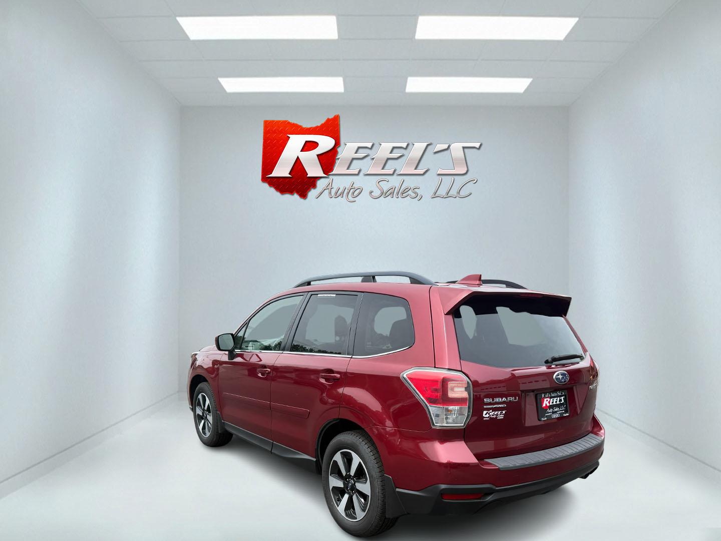 2018 Red /Gray Subaru Forester 2.5i Limited (JF2SJAJC5JH) with an 2.5L H4 DOHC 16V engine, Automatic transmission, located at 547 E. Main St., Orwell, OH, 44076, (440) 437-5893, 41.535435, -80.847855 - This 2018 Subaru Forester 2.5i Limited is a well-equipped compact SUV featuring a 2.5L H4 engine, leather interior, power driver's seat, heated front seats, and a 7.0" touchscreen infotainment system with a backup camera. It offers convenience and safety features like a power liftgate, blind spot mo - Photo#38