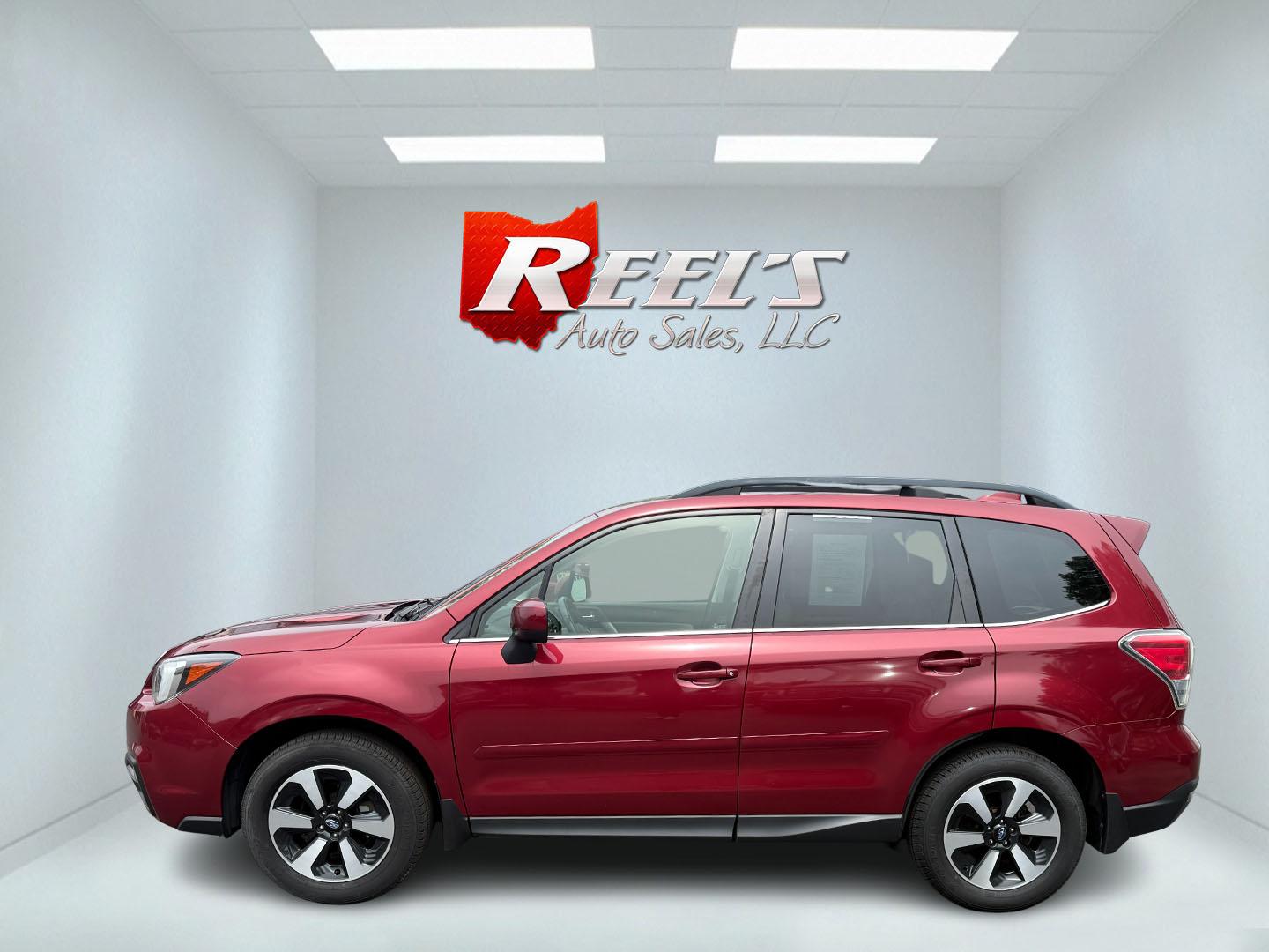 2018 Red /Gray Subaru Forester 2.5i Limited (JF2SJAJC5JH) with an 2.5L H4 DOHC 16V engine, Automatic transmission, located at 547 E. Main St., Orwell, OH, 44076, (440) 437-5893, 41.535435, -80.847855 - This 2018 Subaru Forester 2.5i Limited is a well-equipped compact SUV featuring a 2.5L H4 engine, leather interior, power driver's seat, heated front seats, and a 7.0" touchscreen infotainment system with a backup camera. It offers convenience and safety features like a power liftgate, blind spot mo - Photo#40