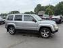 2017 Silver /Black Jeep Patriot High Altitude 4WD (1C4NJRFB3HD) with an 2.4L I4 DOHC 16V engine, 6 Speed Automatic transmission, located at 547 E. Main St., Orwell, OH, 44076, (440) 437-5893, 41.535435, -80.847855 - This 2017 Jeep Patriot High Altitude 4WD is a compact SUV featuring a 2.4L I4 engine paired with a 6-speed automatic transmission, offering capable all-wheel-drive performance. It boasts a leather interior, power driver's seat, heated front seats, remote start, and a 6.5" touchscreen with a backup c - Photo#3