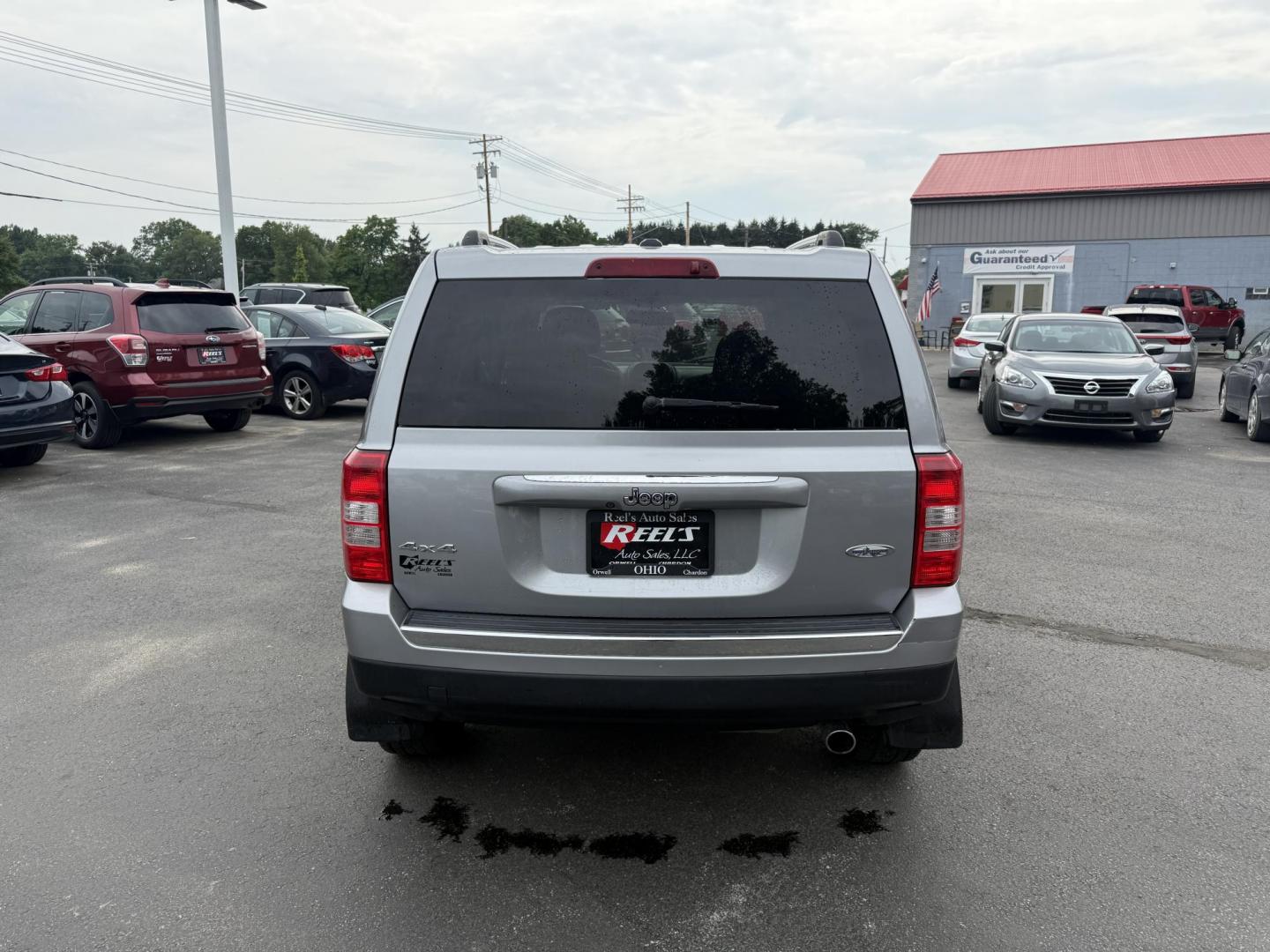 2017 Silver /Black Jeep Patriot High Altitude 4WD (1C4NJRFB3HD) with an 2.4L I4 DOHC 16V engine, 6 Speed Automatic transmission, located at 547 E. Main St., Orwell, OH, 44076, (440) 437-5893, 41.535435, -80.847855 - This 2017 Jeep Patriot High Altitude 4WD is a compact SUV featuring a 2.4L I4 engine paired with a 6-speed automatic transmission, offering capable all-wheel-drive performance. It boasts a leather interior, power driver's seat, heated front seats, remote start, and a 6.5" touchscreen with a backup c - Photo#8
