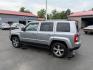 2017 Silver /Black Jeep Patriot High Altitude 4WD (1C4NJRFB3HD) with an 2.4L I4 DOHC 16V engine, 6 Speed Automatic transmission, located at 547 E. Main St., Orwell, OH, 44076, (440) 437-5893, 41.535435, -80.847855 - This 2017 Jeep Patriot High Altitude 4WD is a compact SUV featuring a 2.4L I4 engine paired with a 6-speed automatic transmission, offering capable all-wheel-drive performance. It boasts a leather interior, power driver's seat, heated front seats, remote start, and a 6.5" touchscreen with a backup c - Photo#10