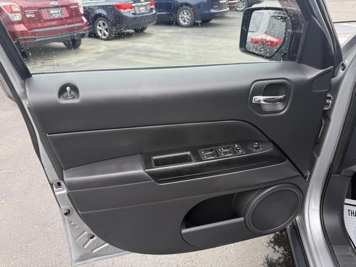 2017 Silver /Black Jeep Patriot High Altitude 4WD (1C4NJRFB3HD) with an 2.4L I4 DOHC 16V engine, 6 Speed Automatic transmission, located at 547 E. Main St., Orwell, OH, 44076, (440) 437-5893, 41.535435, -80.847855 - This 2017 Jeep Patriot High Altitude 4WD is a compact SUV featuring a 2.4L I4 engine paired with a 6-speed automatic transmission, offering capable all-wheel-drive performance. It boasts a leather interior, power driver's seat, heated front seats, remote start, and a 6.5" touchscreen with a backup c - Photo#16