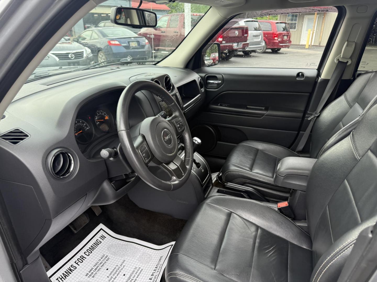 2017 Silver /Black Jeep Patriot High Altitude 4WD (1C4NJRFB3HD) with an 2.4L I4 DOHC 16V engine, 6 Speed Automatic transmission, located at 547 E. Main St., Orwell, OH, 44076, (440) 437-5893, 41.535435, -80.847855 - This 2017 Jeep Patriot High Altitude 4WD is a compact SUV featuring a 2.4L I4 engine paired with a 6-speed automatic transmission, offering capable all-wheel-drive performance. It boasts a leather interior, power driver's seat, heated front seats, remote start, and a 6.5" touchscreen with a backup c - Photo#15