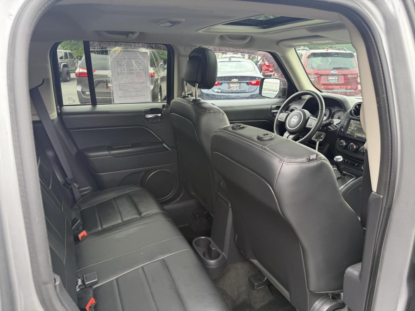 2017 Silver /Black Jeep Patriot High Altitude 4WD (1C4NJRFB3HD) with an 2.4L I4 DOHC 16V engine, 6 Speed Automatic transmission, located at 547 E. Main St., Orwell, OH, 44076, (440) 437-5893, 41.535435, -80.847855 - This 2017 Jeep Patriot High Altitude 4WD is a compact SUV featuring a 2.4L I4 engine paired with a 6-speed automatic transmission, offering capable all-wheel-drive performance. It boasts a leather interior, power driver's seat, heated front seats, remote start, and a 6.5" touchscreen with a backup c - Photo#33