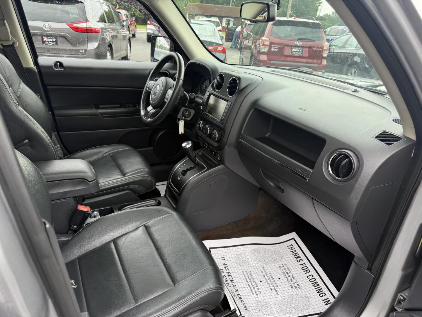 2017 Silver /Black Jeep Patriot High Altitude 4WD (1C4NJRFB3HD) with an 2.4L I4 DOHC 16V engine, 6 Speed Automatic transmission, located at 547 E. Main St., Orwell, OH, 44076, (440) 437-5893, 41.535435, -80.847855 - This 2017 Jeep Patriot High Altitude 4WD is a compact SUV featuring a 2.4L I4 engine paired with a 6-speed automatic transmission, offering capable all-wheel-drive performance. It boasts a leather interior, power driver's seat, heated front seats, remote start, and a 6.5" touchscreen with a backup c - Photo#35