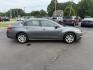 2014 Gray /Black Nissan Altima 2.5 S (1N4AL3AP6EN) with an 2.5L I4 DOHC 16V engine, Automatic transmission, located at 547 E. Main St., Orwell, OH, 44076, (440) 437-5893, 41.535435, -80.847855 - This 2014 Nissan Altima 2.5 S is a midsize sedan equipped with a fuel-efficient 2.5L I4 engine, offering ECO and Sport driving modes and achieving up to 37 MPG on the highway. It features a power driver's seat, a 5.0" center screen, and a backup camera, providing a comfortable and practical driving - Photo#5