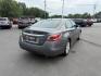 2014 Gray /Black Nissan Altima 2.5 S (1N4AL3AP6EN) with an 2.5L I4 DOHC 16V engine, Automatic transmission, located at 547 E. Main St., Orwell, OH, 44076, (440) 437-5893, 41.535435, -80.847855 - This 2014 Nissan Altima 2.5 S is a midsize sedan equipped with a fuel-efficient 2.5L I4 engine, offering ECO and Sport driving modes and achieving up to 37 MPG on the highway. It features a power driver's seat, a 5.0" center screen, and a backup camera, providing a comfortable and practical driving - Photo#7
