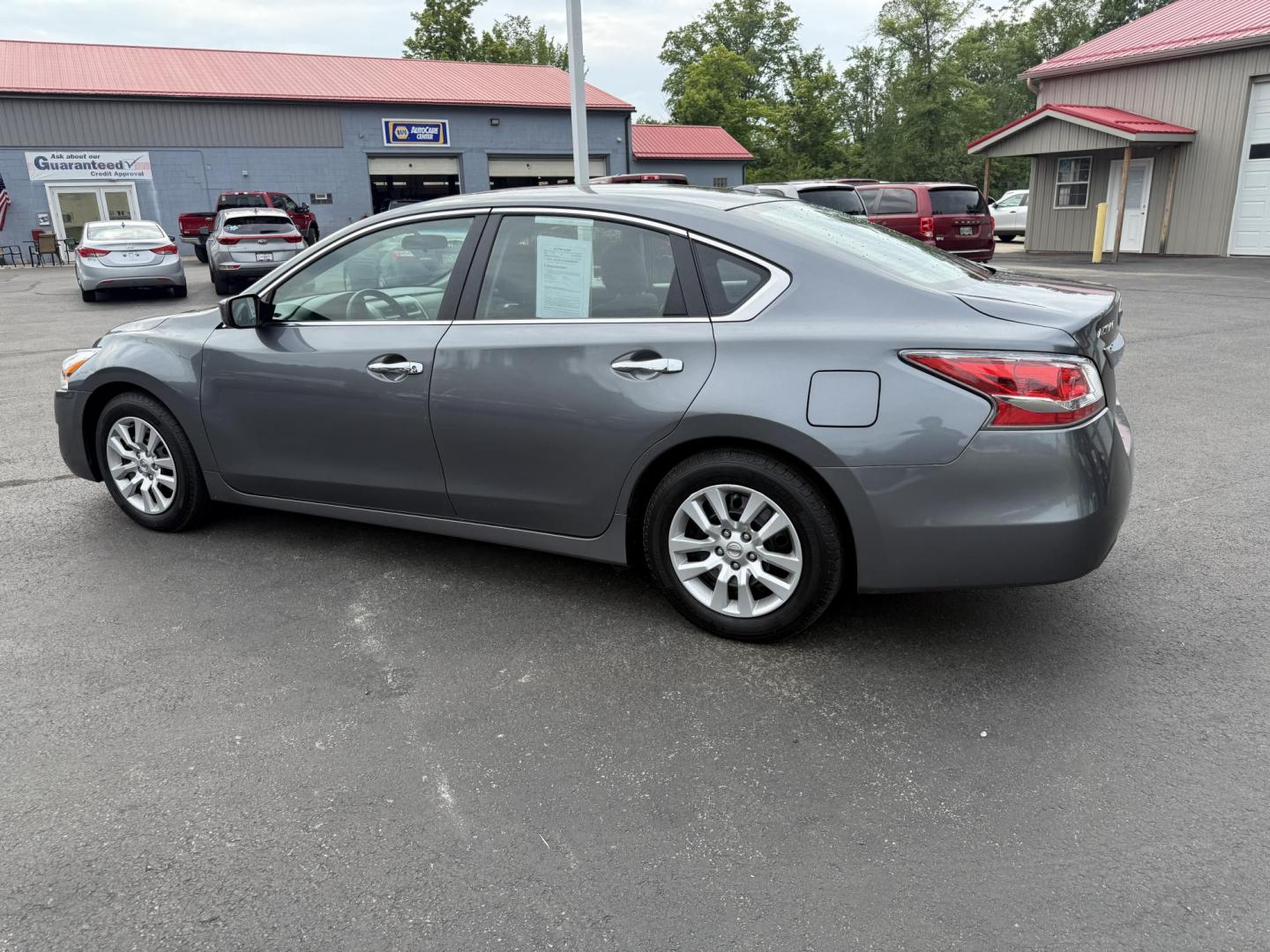 2014 Gray /Black Nissan Altima 2.5 S (1N4AL3AP6EN) with an 2.5L I4 DOHC 16V engine, Automatic transmission, located at 547 E. Main St., Orwell, OH, 44076, (440) 437-5893, 41.535435, -80.847855 - This 2014 Nissan Altima 2.5 S is a midsize sedan equipped with a fuel-efficient 2.5L I4 engine, offering ECO and Sport driving modes and achieving up to 37 MPG on the highway. It features a power driver's seat, a 5.0" center screen, and a backup camera, providing a comfortable and practical driving - Photo#10