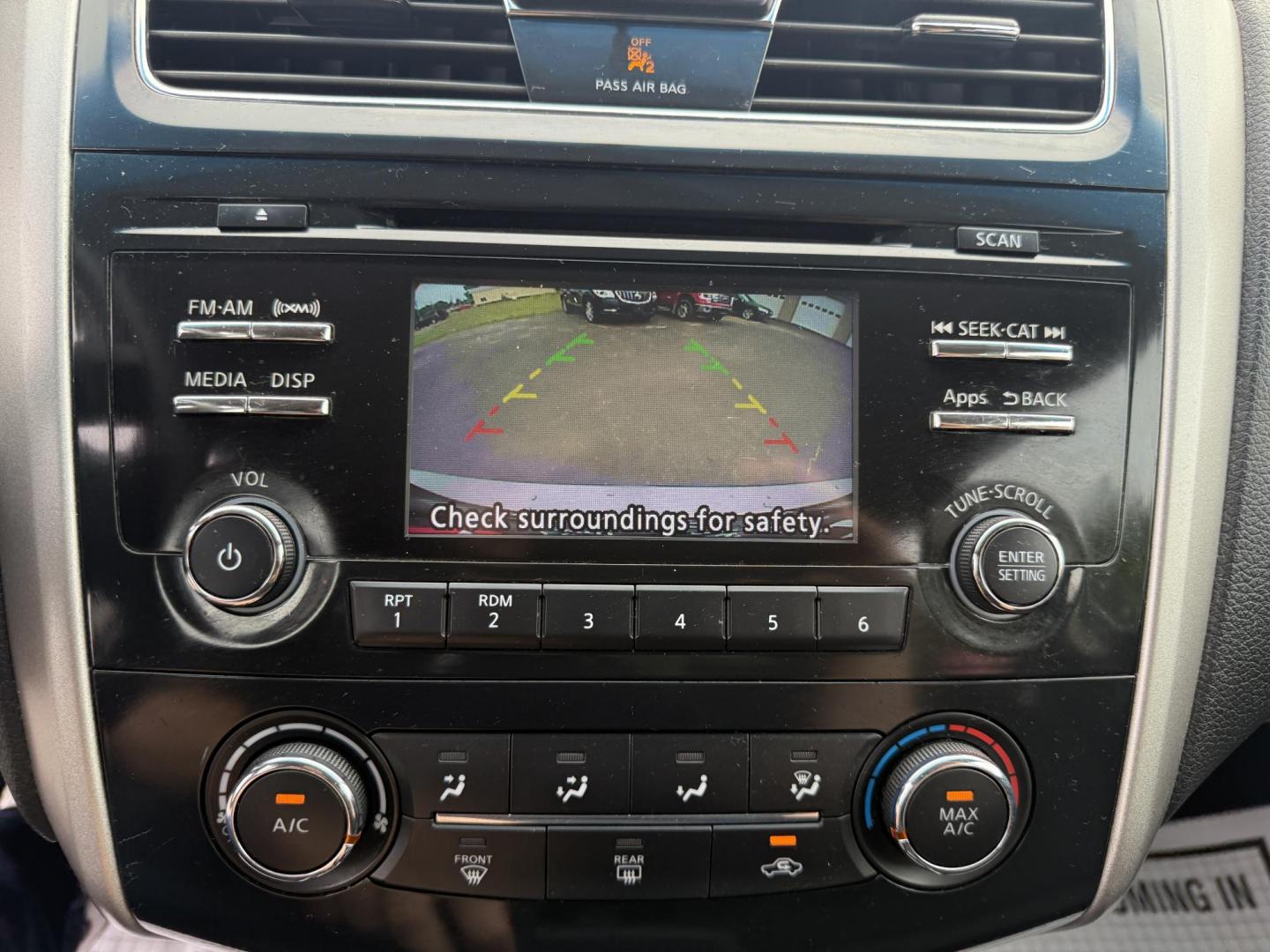 2014 Gray /Black Nissan Altima 2.5 S (1N4AL3AP6EN) with an 2.5L I4 DOHC 16V engine, Automatic transmission, located at 547 E. Main St., Orwell, OH, 44076, (440) 437-5893, 41.535435, -80.847855 - This 2014 Nissan Altima 2.5 S is a midsize sedan equipped with a fuel-efficient 2.5L I4 engine, offering ECO and Sport driving modes and achieving up to 37 MPG on the highway. It features a power driver's seat, a 5.0" center screen, and a backup camera, providing a comfortable and practical driving - Photo#23