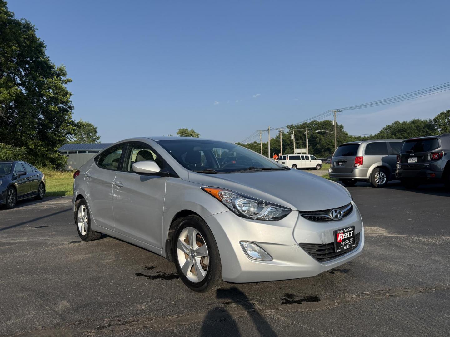 2013 Silver /Gray Hyundai Elantra GLS (5NPDH4AEXDH) with an 1.8L I4 DOHC 16V engine, 6-Speed Automatic transmission, located at 547 E. Main St., Orwell, OH, 44076, (440) 437-5893, 41.535435, -80.847855 - This One Owner Low Miles 2013 Hyundai Elantra GLS is a compact sedan powered by a 1.8L I4 GDI engine paired with a 6-speed automatic transmission, delivering an impressive 38 MPG on the highway. It features heated front seats and a USB audio input for added comfort and convenience, making it an econ - Photo#2