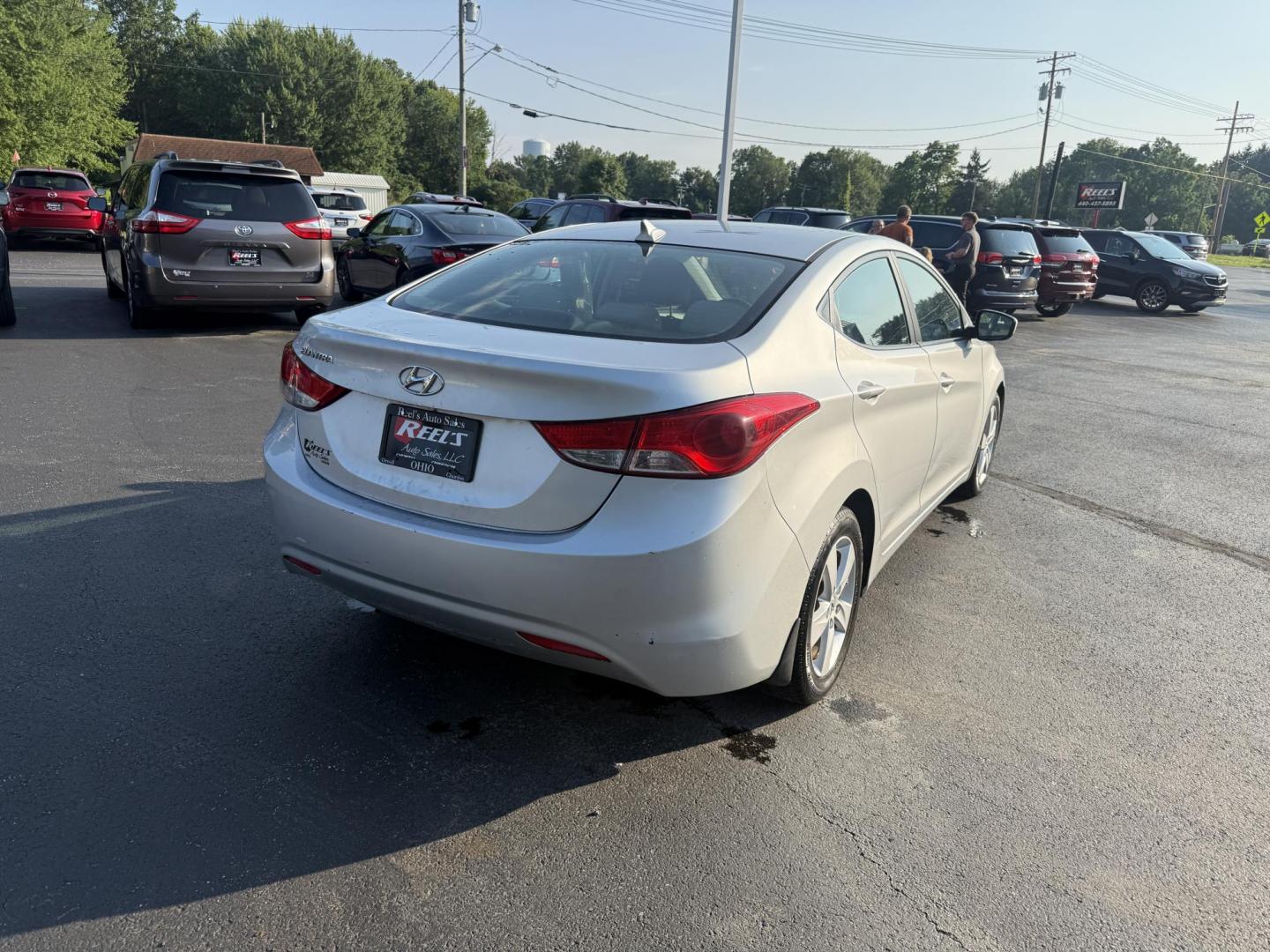 2013 Silver /Gray Hyundai Elantra GLS (5NPDH4AEXDH) with an 1.8L I4 DOHC 16V engine, 6-Speed Automatic transmission, located at 547 E. Main St., Orwell, OH, 44076, (440) 437-5893, 41.535435, -80.847855 - This One Owner Low Miles 2013 Hyundai Elantra GLS is a compact sedan powered by a 1.8L I4 GDI engine paired with a 6-speed automatic transmission, delivering an impressive 38 MPG on the highway. It features heated front seats and a USB audio input for added comfort and convenience, making it an econ - Photo#7