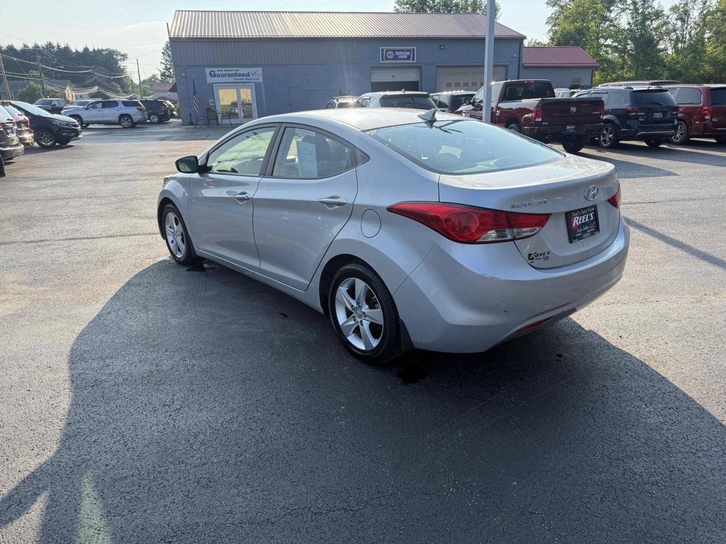 2013 Silver /Gray Hyundai Elantra GLS (5NPDH4AEXDH) with an 1.8L I4 DOHC 16V engine, 6-Speed Automatic transmission, located at 547 E. Main St., Orwell, OH, 44076, (440) 437-5893, 41.535435, -80.847855 - This One Owner Low Miles 2013 Hyundai Elantra GLS is a compact sedan powered by a 1.8L I4 GDI engine paired with a 6-speed automatic transmission, delivering an impressive 38 MPG on the highway. It features heated front seats and a USB audio input for added comfort and convenience, making it an econ - Photo#9