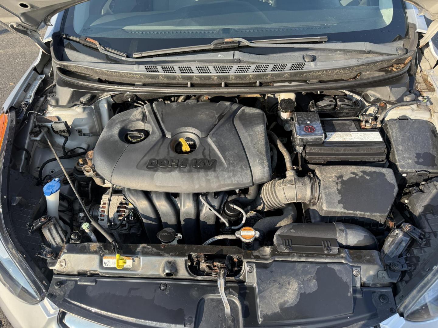 2013 Silver /Gray Hyundai Elantra GLS (5NPDH4AEXDH) with an 1.8L I4 DOHC 16V engine, 6-Speed Automatic transmission, located at 547 E. Main St., Orwell, OH, 44076, (440) 437-5893, 41.535435, -80.847855 - This One Owner Low Miles 2013 Hyundai Elantra GLS is a compact sedan powered by a 1.8L I4 GDI engine paired with a 6-speed automatic transmission, delivering an impressive 38 MPG on the highway. It features heated front seats and a USB audio input for added comfort and convenience, making it an econ - Photo#14