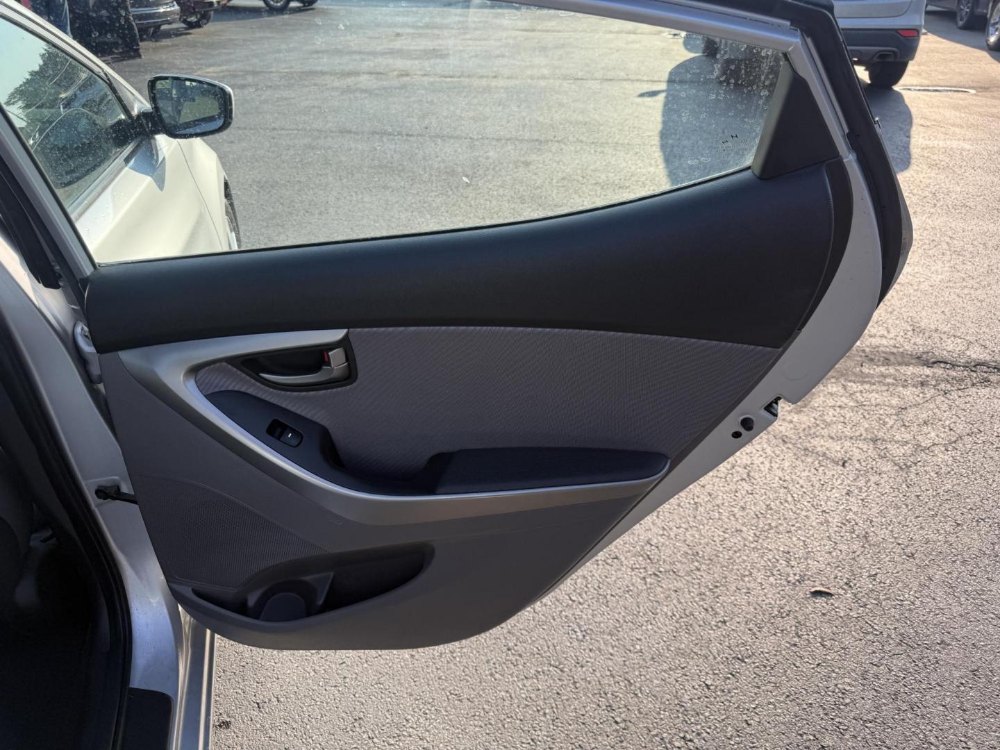 2013 Silver /Gray Hyundai Elantra GLS (5NPDH4AEXDH) with an 1.8L I4 DOHC 16V engine, 6-Speed Automatic transmission, located at 547 E. Main St., Orwell, OH, 44076, (440) 437-5893, 41.535435, -80.847855 - This One Owner Low Miles 2013 Hyundai Elantra GLS is a compact sedan powered by a 1.8L I4 GDI engine paired with a 6-speed automatic transmission, delivering an impressive 38 MPG on the highway. It features heated front seats and a USB audio input for added comfort and convenience, making it an econ - Photo#30