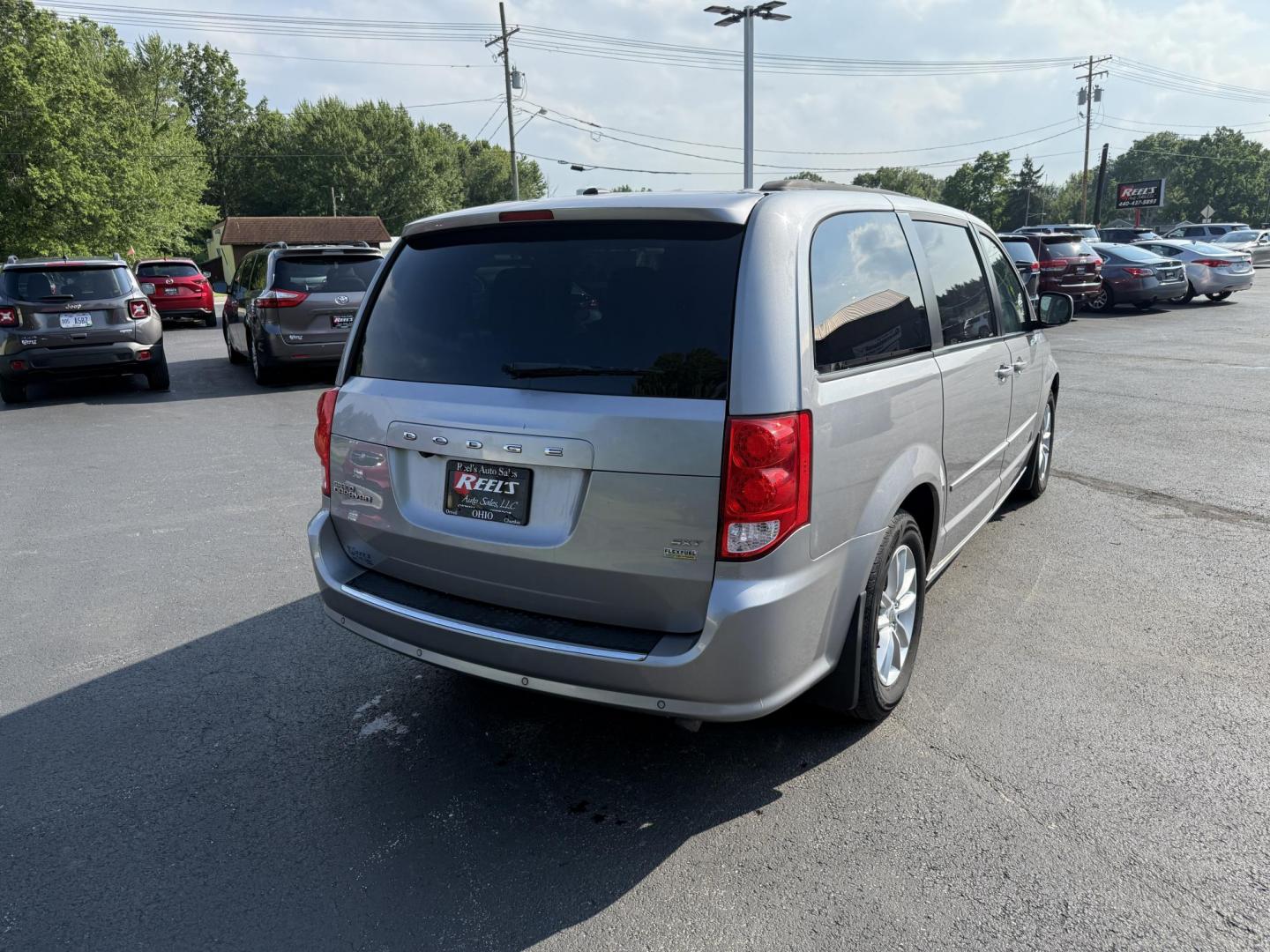 2016 Silver /Black Dodge Grand Caravan SXT (2C4RDGCG6GR) with an 3.6L V6 DOHC 24V FFV engine, 6A transmission, located at 547 E. Main St., Orwell, OH, 44076, (440) 437-5893, 41.535435, -80.847855 - Photo#7