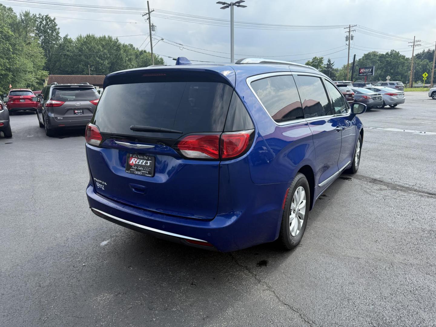 2018 Blue /Tan Chrysler Pacifica Touring-L Plus (2C4RC1EG9JR) with an 3.6L V6 DOHC 24V engine, 9A transmission, located at 547 E. Main St., Orwell, OH, 44076, (440) 437-5893, 41.535435, -80.847855 - Photo#7
