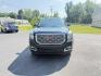 2018 Black /Black GMC Yukon Denali 4WD (1GKS2CKJ2JR) with an 6.2L V8 OHV 16V engine, 10 Speed Auto transmission, located at 11115 Chardon Rd. , Chardon, OH, 44024, (440) 214-9705, 41.580246, -81.241943 - This 2018 GMC Yukon Denali 4WD is a luxury full-size SUV powered by the incredible 6.2L V8 engine paired with a 10-speed automatic transmission, delivering 420 horsepower and 460 lb-ft of torque. It boasts an impressive 8,100-pound towing capacity and features Magnetic Ride Control for enhanced ride - Photo#1