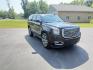 2018 Black /Black GMC Yukon Denali 4WD (1GKS2CKJ2JR) with an 6.2L V8 OHV 16V engine, 10 Speed Auto transmission, located at 11115 Chardon Rd. , Chardon, OH, 44024, (440) 214-9705, 41.580246, -81.241943 - This 2018 GMC Yukon Denali 4WD is a luxury full-size SUV powered by the incredible 6.2L V8 engine paired with a 10-speed automatic transmission, delivering 420 horsepower and 460 lb-ft of torque. It boasts an impressive 8,100-pound towing capacity and features Magnetic Ride Control for enhanced ride - Photo#2
