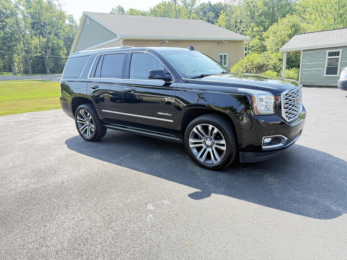 2018 Black /Black GMC Yukon Denali 4WD (1GKS2CKJ2JR) with an 6.2L V8 OHV 16V engine, 10 Speed Auto transmission, located at 11115 Chardon Rd. , Chardon, OH, 44024, (440) 214-9705, 41.580246, -81.241943 - This 2018 GMC Yukon Denali 4WD is a luxury full-size SUV powered by the incredible 6.2L V8 engine paired with a 10-speed automatic transmission, delivering 420 horsepower and 460 lb-ft of torque. It boasts an impressive 8,100-pound towing capacity and features Magnetic Ride Control for enhanced ride - Photo#3