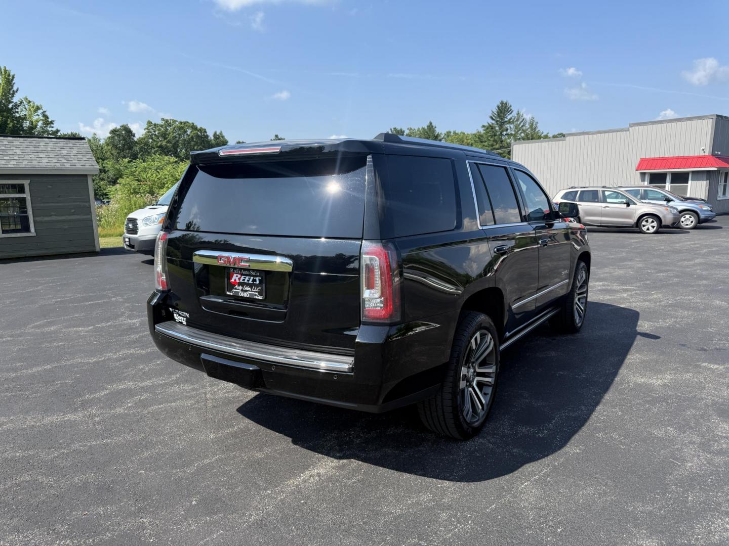 2018 Black /Black GMC Yukon Denali 4WD (1GKS2CKJ2JR) with an 6.2L V8 OHV 16V engine, 10 Speed Auto transmission, located at 11115 Chardon Rd. , Chardon, OH, 44024, (440) 214-9705, 41.580246, -81.241943 - This 2018 GMC Yukon Denali 4WD is a luxury full-size SUV powered by the incredible 6.2L V8 engine paired with a 10-speed automatic transmission, delivering 420 horsepower and 460 lb-ft of torque. It boasts an impressive 8,100-pound towing capacity and features Magnetic Ride Control for enhanced ride - Photo#8
