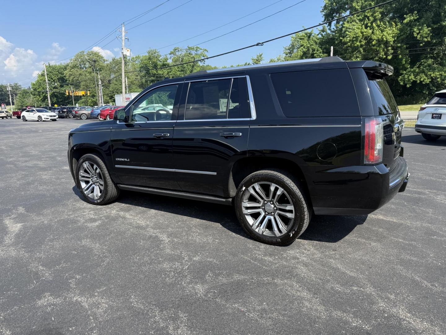 2018 Black /Black GMC Yukon Denali 4WD (1GKS2CKJ2JR) with an 6.2L V8 OHV 16V engine, 10 Speed Auto transmission, located at 11115 Chardon Rd. , Chardon, OH, 44024, (440) 214-9705, 41.580246, -81.241943 - This 2018 GMC Yukon Denali 4WD is a luxury full-size SUV powered by the incredible 6.2L V8 engine paired with a 10-speed automatic transmission, delivering 420 horsepower and 460 lb-ft of torque. It boasts an impressive 8,100-pound towing capacity and features Magnetic Ride Control for enhanced ride - Photo#11
