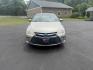 2015 Gold /Black Toyota Camry Hybrid LE (4T1BD1FK0FU) with an 2.5L I4 DOHC 16V HYBRID engine, Automatic transmission, located at 11115 Chardon Rd. , Chardon, OH, 44024, (440) 214-9705, 41.580246, -81.241943 - This 2015 Toyota Camry LE Hybrid is a fuel-efficient midsize sedan offering an impressive 40 MPG combined and a net power output of 200 horsepower. It features practical amenities like dusk-sensing headlights, dual-zone automatic climate control, an 8-way power driver’s seat, a 6.1-inch touchscree - Photo#1
