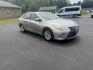 2015 Gold /Black Toyota Camry Hybrid LE (4T1BD1FK0FU) with an 2.5L I4 DOHC 16V HYBRID engine, Automatic transmission, located at 11115 Chardon Rd. , Chardon, OH, 44024, (440) 214-9705, 41.580246, -81.241943 - This 2015 Toyota Camry LE Hybrid is a fuel-efficient midsize sedan offering an impressive 40 MPG combined and a net power output of 200 horsepower. It features practical amenities like dusk-sensing headlights, dual-zone automatic climate control, an 8-way power driver’s seat, a 6.1-inch touchscree - Photo#2