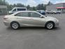 2015 Gold /Black Toyota Camry Hybrid LE (4T1BD1FK0FU) with an 2.5L I4 DOHC 16V HYBRID engine, Automatic transmission, located at 11115 Chardon Rd. , Chardon, OH, 44024, (440) 214-9705, 41.580246, -81.241943 - This 2015 Toyota Camry LE Hybrid is a fuel-efficient midsize sedan offering an impressive 40 MPG combined and a net power output of 200 horsepower. It features practical amenities like dusk-sensing headlights, dual-zone automatic climate control, an 8-way power driver’s seat, a 6.1-inch touchscree - Photo#5