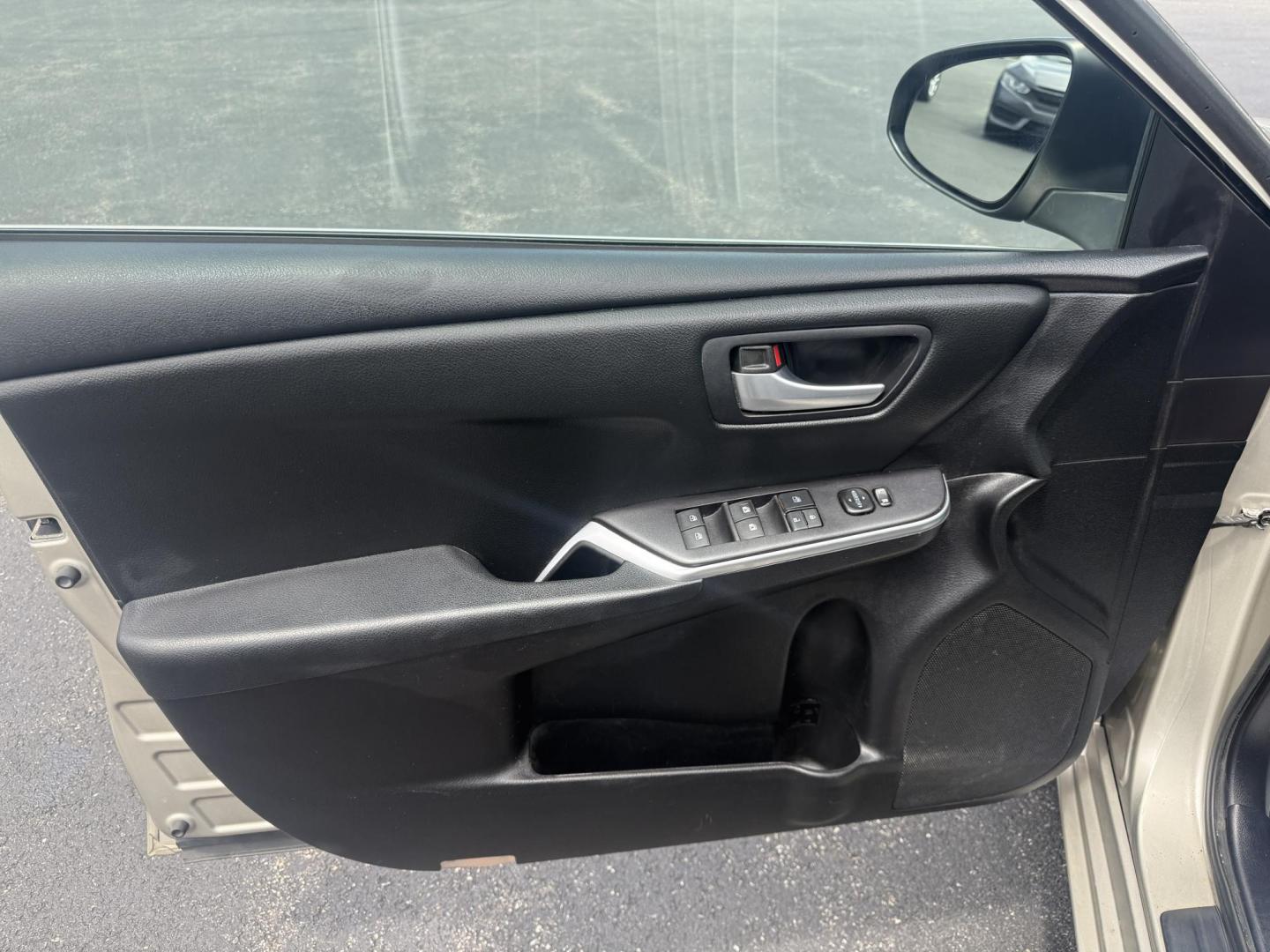 2015 Gold /Black Toyota Camry Hybrid LE (4T1BD1FK0FU) with an 2.5L I4 DOHC 16V HYBRID engine, Automatic transmission, located at 11115 Chardon Rd. , Chardon, OH, 44024, (440) 214-9705, 41.580246, -81.241943 - This 2015 Toyota Camry LE Hybrid is a fuel-efficient midsize sedan offering an impressive 40 MPG combined and a net power output of 200 horsepower. It features practical amenities like dusk-sensing headlights, dual-zone automatic climate control, an 8-way power driver’s seat, a 6.1-inch touchscree - Photo#16