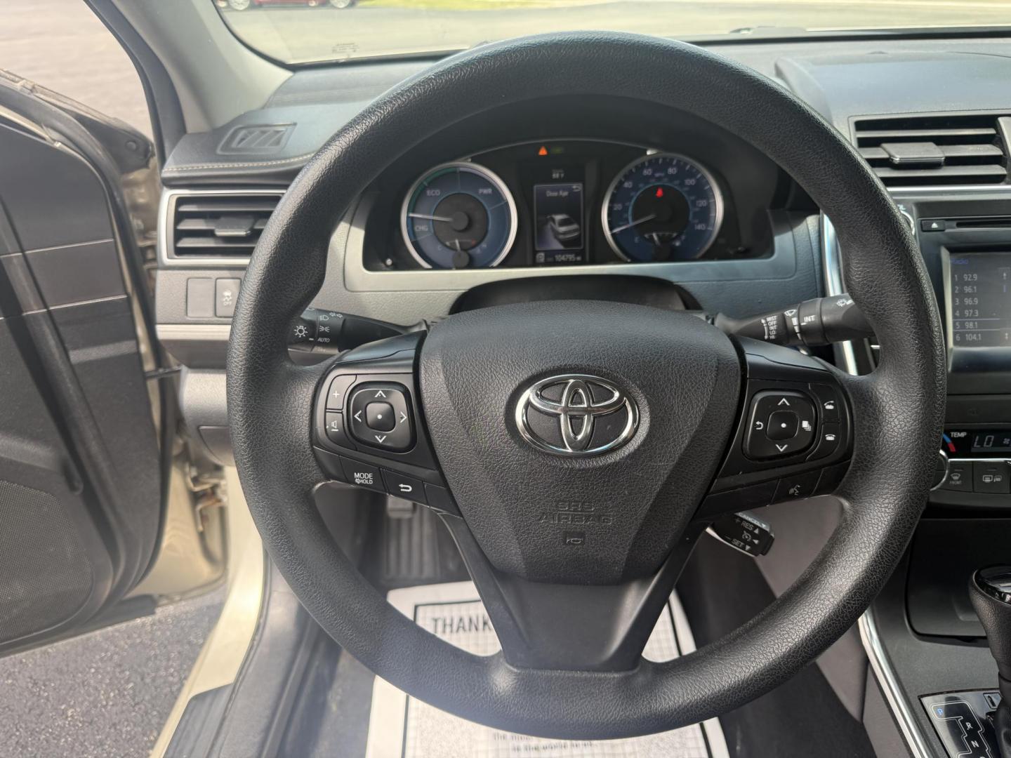 2015 Gold /Black Toyota Camry Hybrid LE (4T1BD1FK0FU) with an 2.5L I4 DOHC 16V HYBRID engine, Automatic transmission, located at 11115 Chardon Rd. , Chardon, OH, 44024, (440) 214-9705, 41.580246, -81.241943 - This 2015 Toyota Camry LE Hybrid is a fuel-efficient midsize sedan offering an impressive 40 MPG combined and a net power output of 200 horsepower. It features practical amenities like dusk-sensing headlights, dual-zone automatic climate control, an 8-way power driver’s seat, a 6.1-inch touchscree - Photo#22