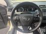 2015 Gold /Black Toyota Camry Hybrid LE (4T1BD1FK0FU) with an 2.5L I4 DOHC 16V HYBRID engine, Automatic transmission, located at 11115 Chardon Rd. , Chardon, OH, 44024, (440) 214-9705, 41.580246, -81.241943 - This 2015 Toyota Camry LE Hybrid is a fuel-efficient midsize sedan offering an impressive 40 MPG combined and a net power output of 200 horsepower. It features practical amenities like dusk-sensing headlights, dual-zone automatic climate control, an 8-way power driver’s seat, a 6.1-inch touchscree - Photo#22