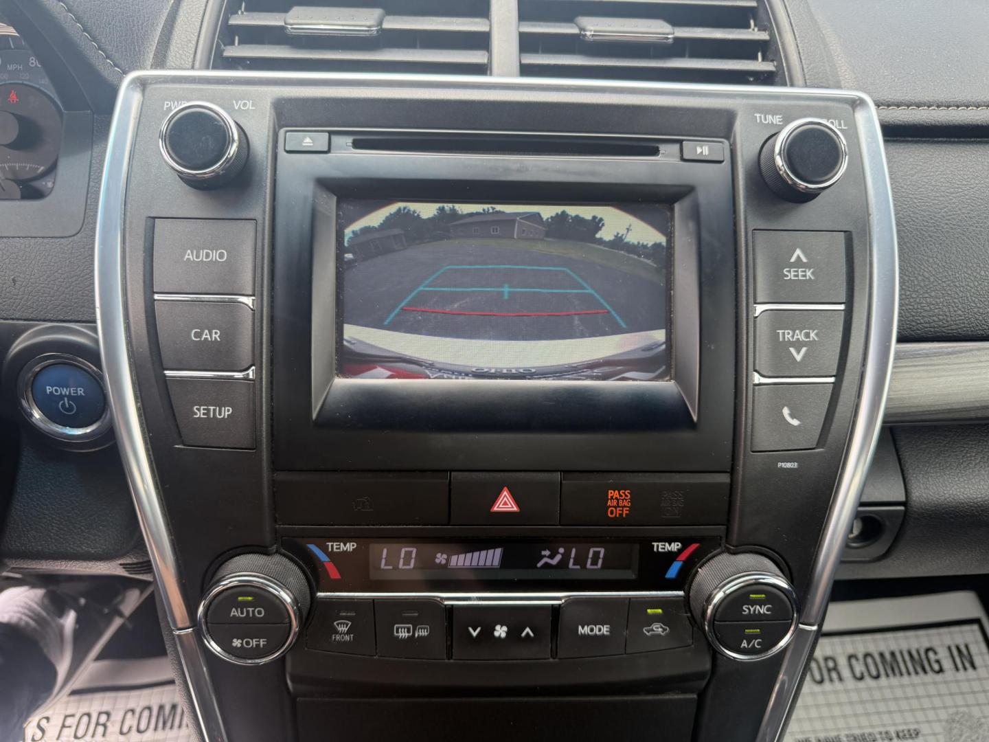 2015 Gold /Black Toyota Camry Hybrid LE (4T1BD1FK0FU) with an 2.5L I4 DOHC 16V HYBRID engine, Automatic transmission, located at 11115 Chardon Rd. , Chardon, OH, 44024, (440) 214-9705, 41.580246, -81.241943 - This 2015 Toyota Camry LE Hybrid is a fuel-efficient midsize sedan offering an impressive 40 MPG combined and a net power output of 200 horsepower. It features practical amenities like dusk-sensing headlights, dual-zone automatic climate control, an 8-way power driver’s seat, a 6.1-inch touchscree - Photo#24