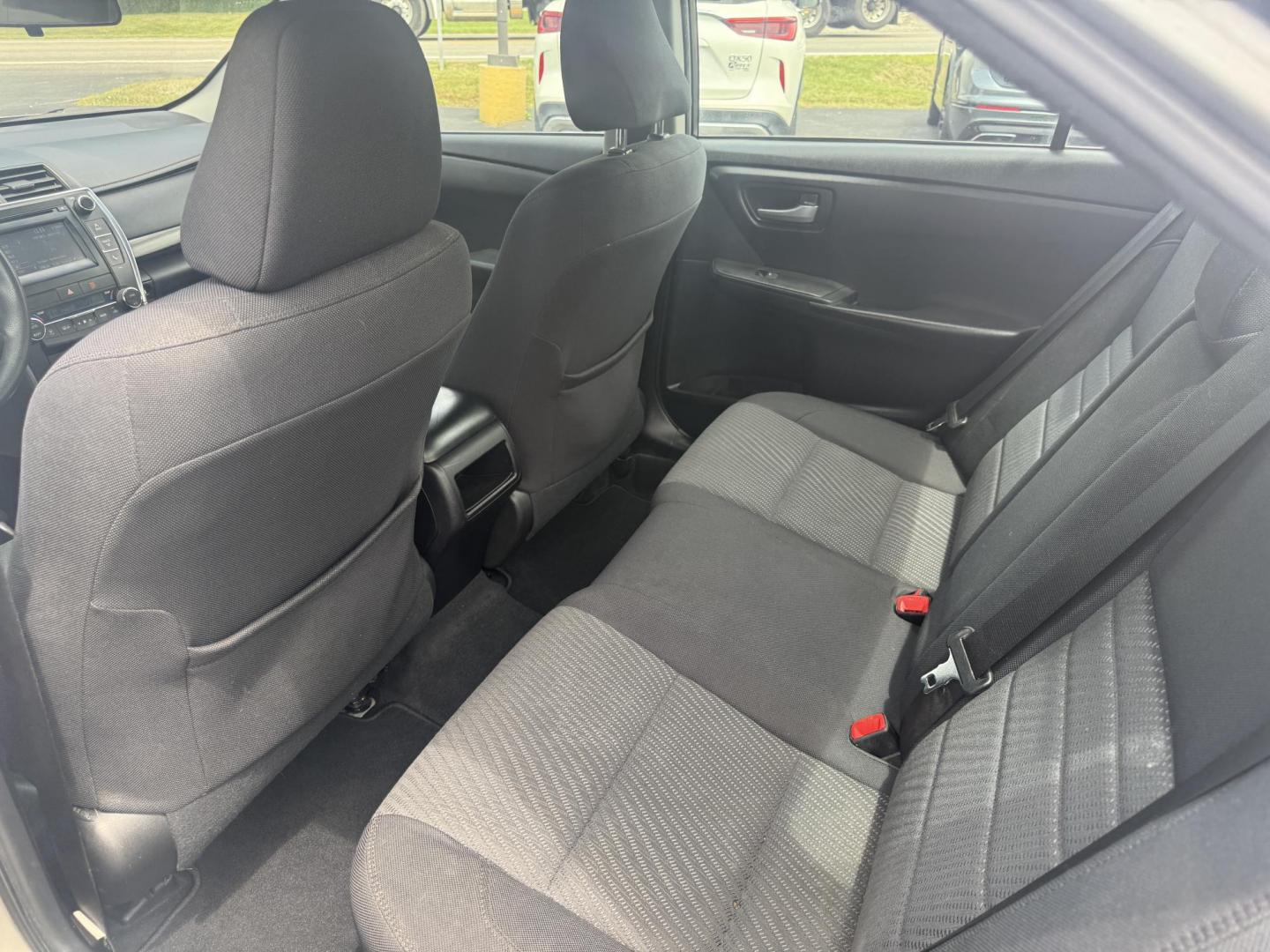 2015 Gold /Black Toyota Camry Hybrid LE (4T1BD1FK0FU) with an 2.5L I4 DOHC 16V HYBRID engine, Automatic transmission, located at 11115 Chardon Rd. , Chardon, OH, 44024, (440) 214-9705, 41.580246, -81.241943 - This 2015 Toyota Camry LE Hybrid is a fuel-efficient midsize sedan offering an impressive 40 MPG combined and a net power output of 200 horsepower. It features practical amenities like dusk-sensing headlights, dual-zone automatic climate control, an 8-way power driver’s seat, a 6.1-inch touchscree - Photo#27