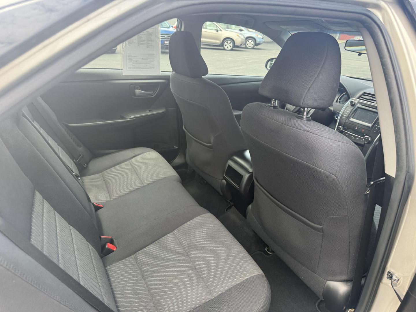 2015 Gold /Black Toyota Camry Hybrid LE (4T1BD1FK0FU) with an 2.5L I4 DOHC 16V HYBRID engine, Automatic transmission, located at 11115 Chardon Rd. , Chardon, OH, 44024, (440) 214-9705, 41.580246, -81.241943 - This 2015 Toyota Camry LE Hybrid is a fuel-efficient midsize sedan offering an impressive 40 MPG combined and a net power output of 200 horsepower. It features practical amenities like dusk-sensing headlights, dual-zone automatic climate control, an 8-way power driver’s seat, a 6.1-inch touchscree - Photo#32