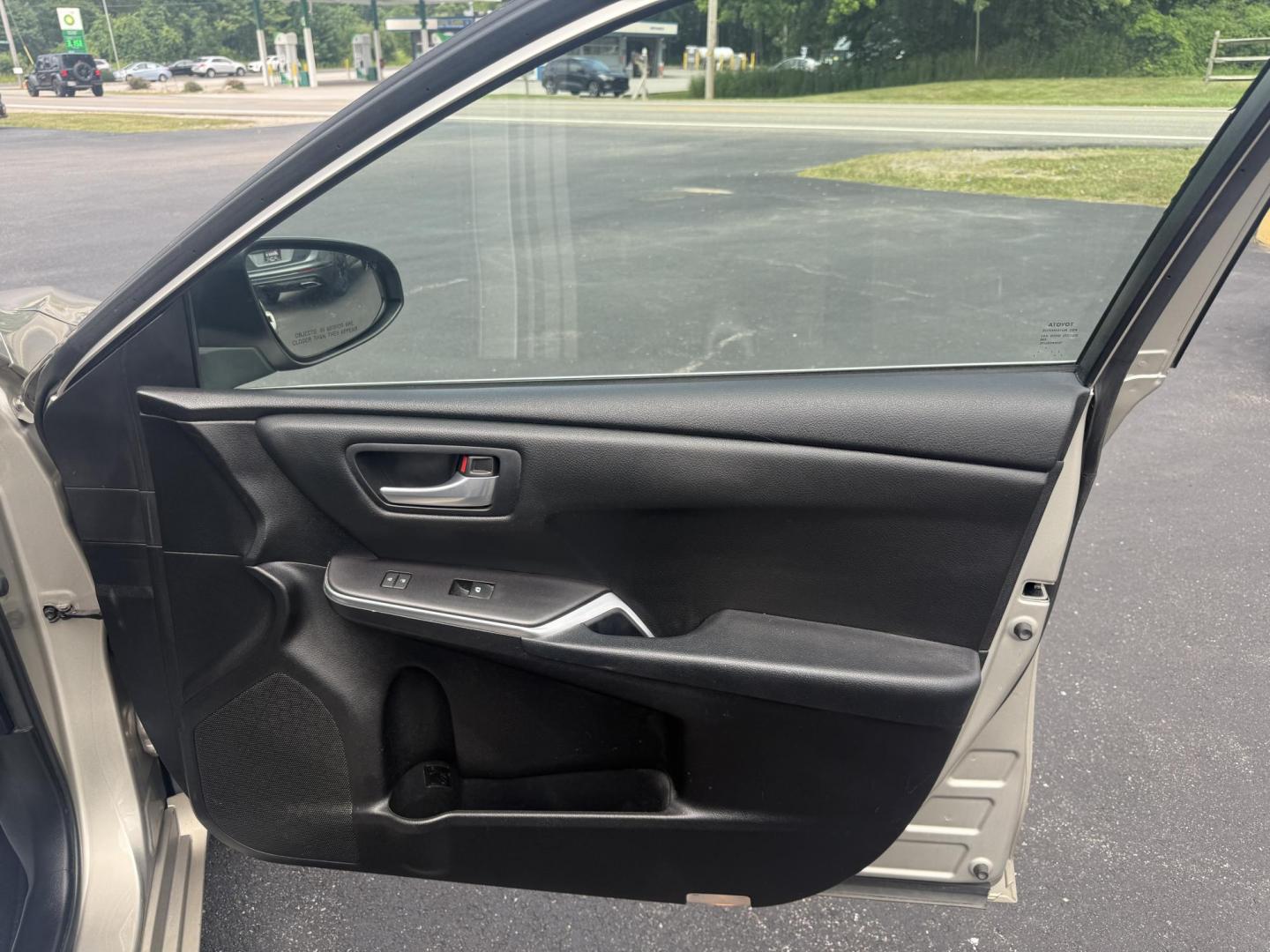 2015 Gold /Black Toyota Camry Hybrid LE (4T1BD1FK0FU) with an 2.5L I4 DOHC 16V HYBRID engine, Automatic transmission, located at 11115 Chardon Rd. , Chardon, OH, 44024, (440) 214-9705, 41.580246, -81.241943 - This 2015 Toyota Camry LE Hybrid is a fuel-efficient midsize sedan offering an impressive 40 MPG combined and a net power output of 200 horsepower. It features practical amenities like dusk-sensing headlights, dual-zone automatic climate control, an 8-way power driver’s seat, a 6.1-inch touchscree - Photo#37