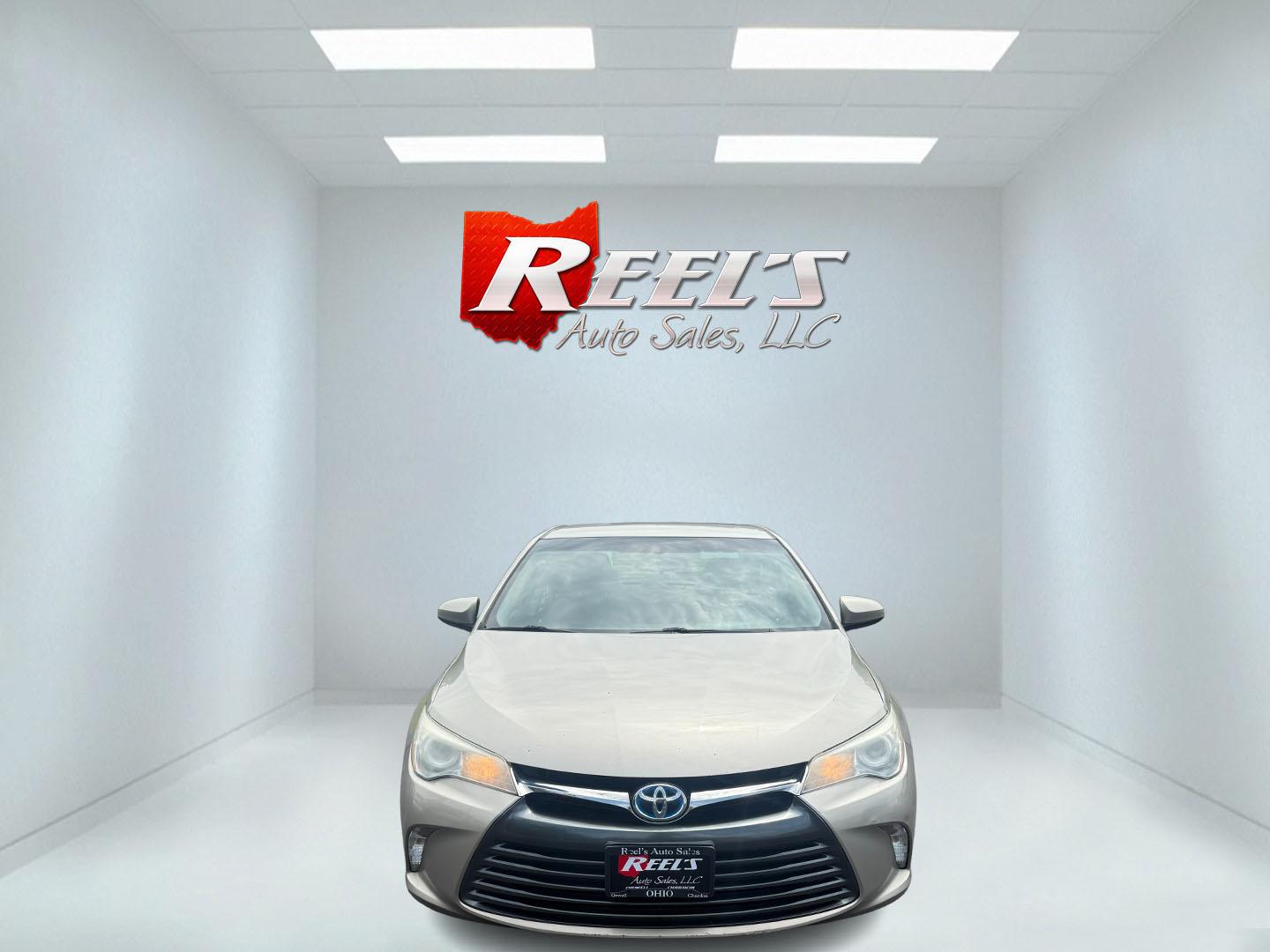 2015 Gold /Black Toyota Camry Hybrid LE (4T1BD1FK0FU) with an 2.5L I4 DOHC 16V HYBRID engine, Automatic transmission, located at 11115 Chardon Rd. , Chardon, OH, 44024, (440) 214-9705, 41.580246, -81.241943 - This 2015 Toyota Camry LE Hybrid is a fuel-efficient midsize sedan offering an impressive 40 MPG combined and a net power output of 200 horsepower. It features practical amenities like dusk-sensing headlights, dual-zone automatic climate control, an 8-way power driver’s seat, a 6.1-inch touchscree - Photo#1