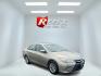 2015 Gold /Black Toyota Camry Hybrid LE (4T1BD1FK0FU) with an 2.5L I4 DOHC 16V HYBRID engine, Automatic transmission, located at 11115 Chardon Rd. , Chardon, OH, 44024, (440) 214-9705, 41.580246, -81.241943 - This 2015 Toyota Camry LE Hybrid is a fuel-efficient midsize sedan offering an impressive 40 MPG combined and a net power output of 200 horsepower. It features practical amenities like dusk-sensing headlights, dual-zone automatic climate control, an 8-way power driver’s seat, a 6.1-inch touchscree - Photo#2