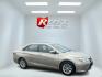 2015 Gold /Black Toyota Camry Hybrid LE (4T1BD1FK0FU) with an 2.5L I4 DOHC 16V HYBRID engine, Automatic transmission, located at 11115 Chardon Rd. , Chardon, OH, 44024, (440) 214-9705, 41.580246, -81.241943 - This 2015 Toyota Camry LE Hybrid is a fuel-efficient midsize sedan offering an impressive 40 MPG combined and a net power output of 200 horsepower. It features practical amenities like dusk-sensing headlights, dual-zone automatic climate control, an 8-way power driver’s seat, a 6.1-inch touchscree - Photo#32