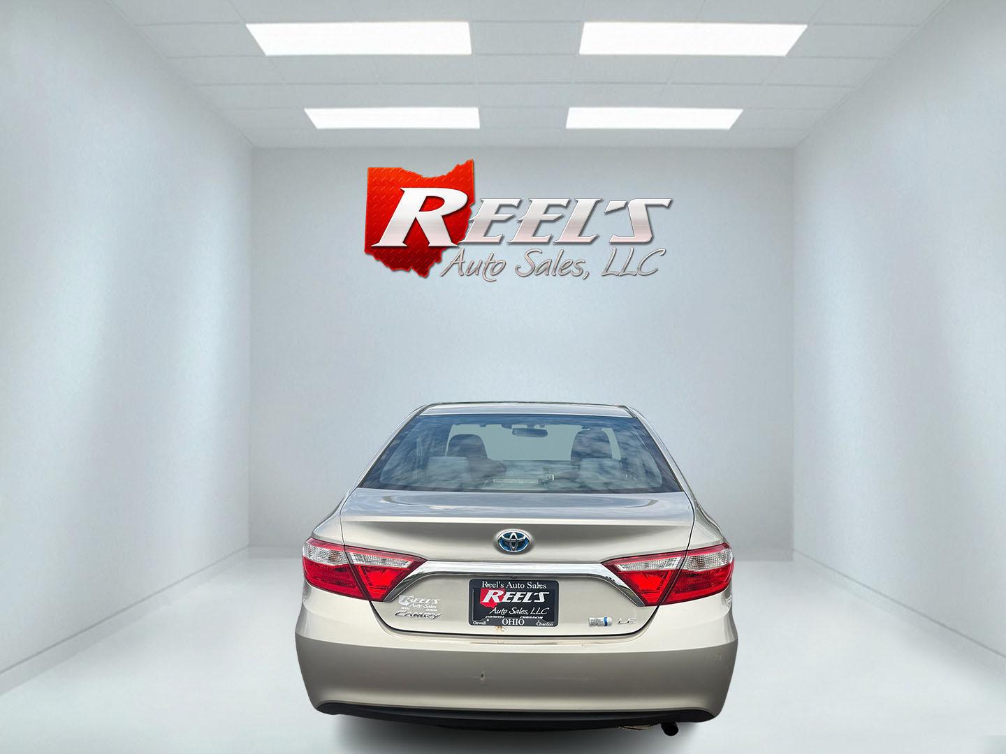 2015 Gold /Black Toyota Camry Hybrid LE (4T1BD1FK0FU) with an 2.5L I4 DOHC 16V HYBRID engine, Automatic transmission, located at 11115 Chardon Rd. , Chardon, OH, 44024, (440) 214-9705, 41.580246, -81.241943 - This 2015 Toyota Camry LE Hybrid is a fuel-efficient midsize sedan offering an impressive 40 MPG combined and a net power output of 200 horsepower. It features practical amenities like dusk-sensing headlights, dual-zone automatic climate control, an 8-way power driver’s seat, a 6.1-inch touchscree - Photo#35