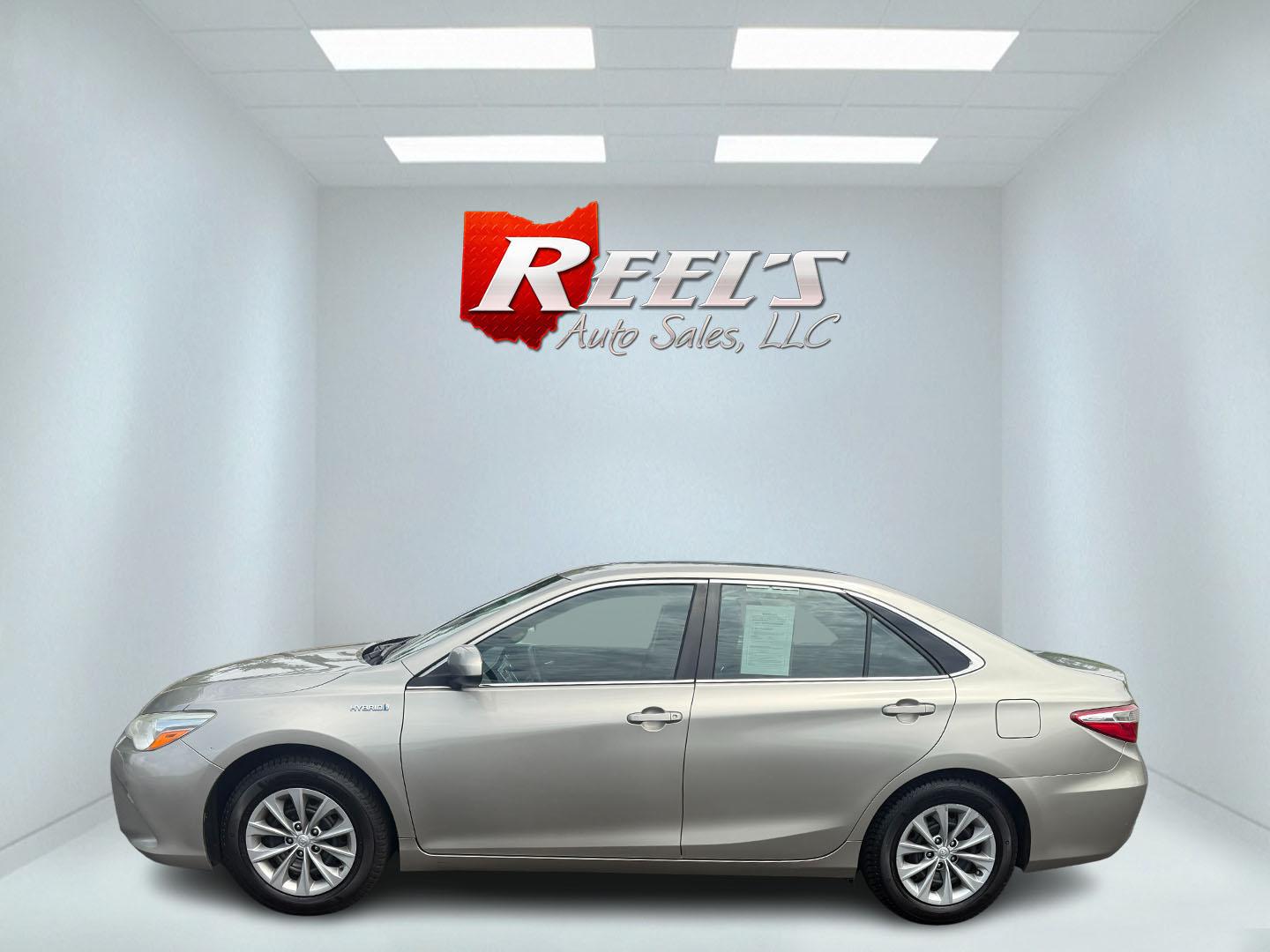 2015 Gold /Black Toyota Camry Hybrid LE (4T1BD1FK0FU) with an 2.5L I4 DOHC 16V HYBRID engine, Automatic transmission, located at 11115 Chardon Rd. , Chardon, OH, 44024, (440) 214-9705, 41.580246, -81.241943 - This 2015 Toyota Camry LE Hybrid is a fuel-efficient midsize sedan offering an impressive 40 MPG combined and a net power output of 200 horsepower. It features practical amenities like dusk-sensing headlights, dual-zone automatic climate control, an 8-way power driver’s seat, a 6.1-inch touchscree - Photo#38
