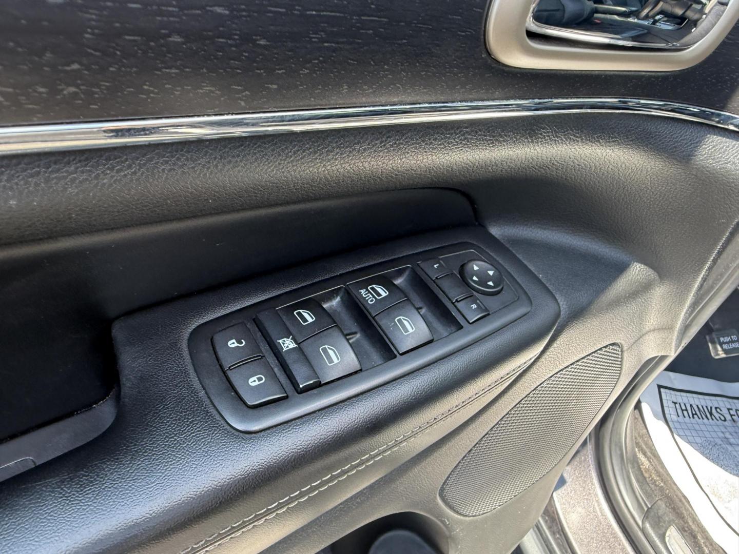 2015 Gray /Black Jeep Grand Cherokee Limited 4WD (1C4RJFBG8FC) with an 3.6L V6 DOHC 24V FFV engine, 8-Speed Automatic transmission, located at 11115 Chardon Rd. , Chardon, OH, 44024, (440) 214-9705, 41.580246, -81.241943 - This 2015 Jeep Grand Cherokee Limited 4WD offers a blend of luxury and capability, powered by a 3.6L Pentastar V6 engine paired with an 8-speed automatic transmission and featuring the advanced Quadra-Drive II 4WD system for enhanced off-road performance. Inside, it boasts a leather interior with he - Photo#8