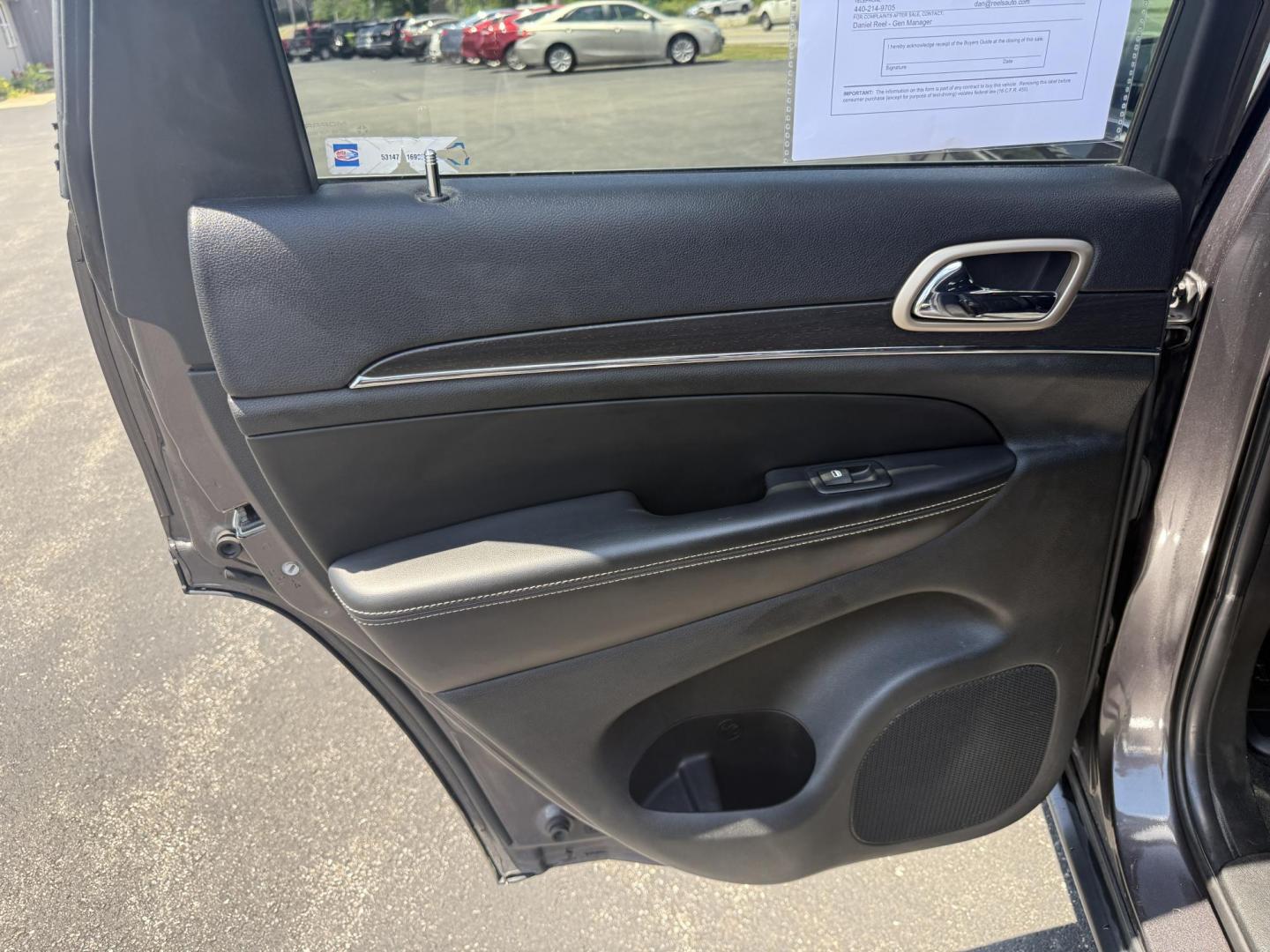 2015 Gray /Black Jeep Grand Cherokee Limited 4WD (1C4RJFBG8FC) with an 3.6L V6 DOHC 24V FFV engine, 8-Speed Automatic transmission, located at 11115 Chardon Rd. , Chardon, OH, 44024, (440) 214-9705, 41.580246, -81.241943 - This 2015 Jeep Grand Cherokee Limited 4WD offers a blend of luxury and capability, powered by a 3.6L Pentastar V6 engine paired with an 8-speed automatic transmission and featuring the advanced Quadra-Drive II 4WD system for enhanced off-road performance. Inside, it boasts a leather interior with he - Photo#27