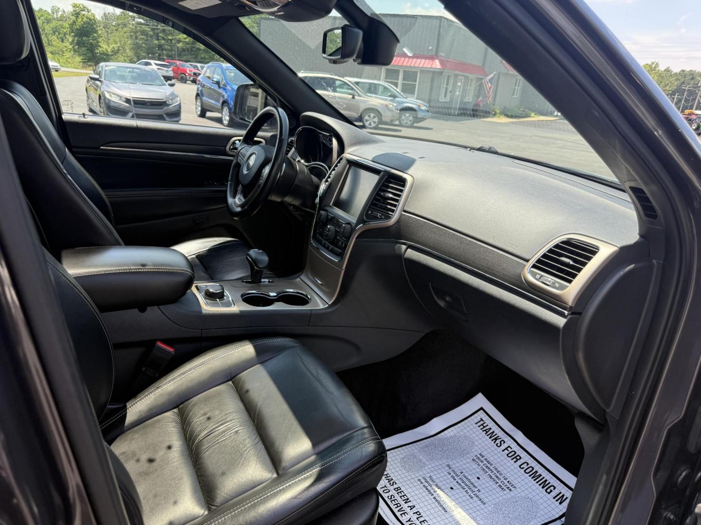 2015 Gray /Black Jeep Grand Cherokee Limited 4WD (1C4RJFBG8FC) with an 3.6L V6 DOHC 24V FFV engine, 8-Speed Automatic transmission, located at 11115 Chardon Rd. , Chardon, OH, 44024, (440) 214-9705, 41.580246, -81.241943 - This 2015 Jeep Grand Cherokee Limited 4WD offers a blend of luxury and capability, powered by a 3.6L Pentastar V6 engine paired with an 8-speed automatic transmission and featuring the advanced Quadra-Drive II 4WD system for enhanced off-road performance. Inside, it boasts a leather interior with he - Photo#36