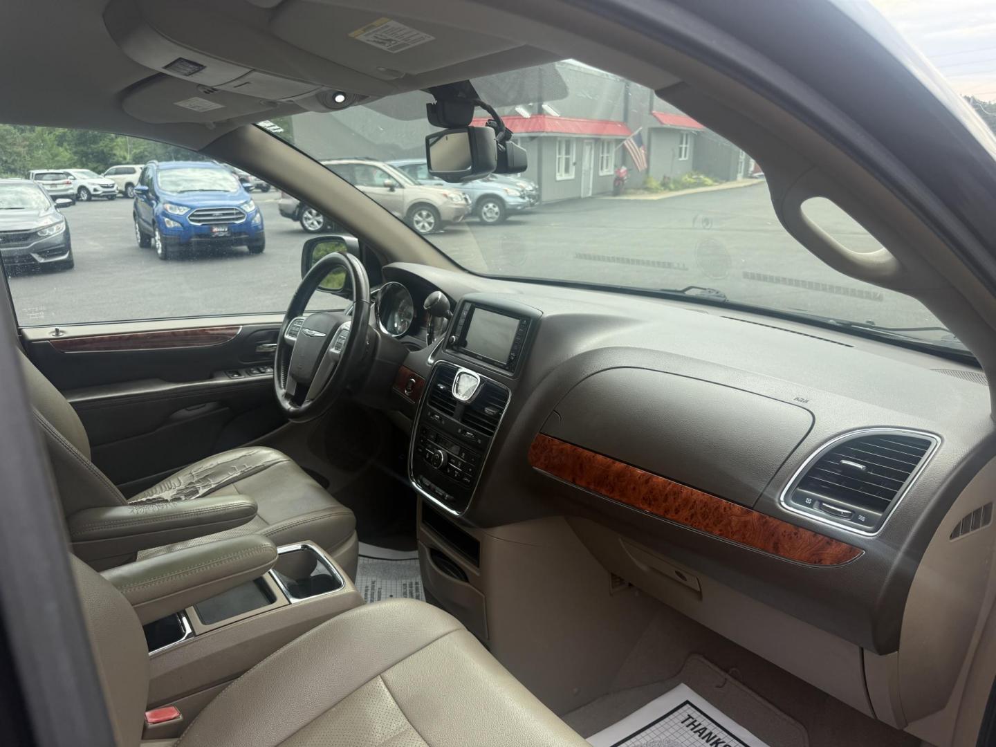 2015 Gray /Tan Chrysler Town & Country Touring-L (2C4RC1CG2FR) with an 3.6L V6 DOHC 24V engine, 6-Speed Automatic transmission, located at 11115 Chardon Rd. , Chardon, OH, 44024, (440) 214-9705, 41.580246, -81.241943 - This One Owner 2015 Chrysler Town & Country Touring-L is a well-appointed minivan featuring a 3.6L Pentastar V6 engine and 6-speed automatic transmission, with leather interior, power front seats, tri-zone automatic climate control, heated front and second-row captain’s seats, and Stow ’n Go sea - Photo#40