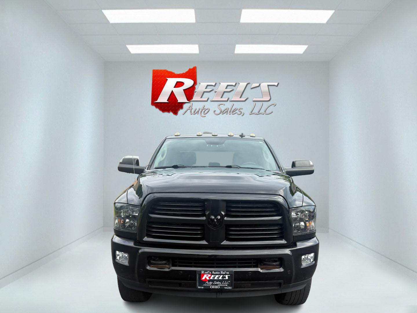2017 Black /Black RAM 2500 Bighorn Crew Cab SWB 4WD (3C6UR5DJ8HG) with an 6.4L V8 engine, 6A transmission, located at 11115 Chardon Rd. , Chardon, OH, 44024, (440) 214-9705, 41.580246, -81.241943 - This 2017 Ram 2500 Big Horn Crew Cab with the 6.4L HEMI V8 and 6-speed automatic transmission is a powerful heavy-duty truck, boasting a 12,630-pound towing capacity and 3.73 gearing with a limited-slip rear differential for enhanced traction. It features a power driver’s seat, heated front seats, - Photo#1