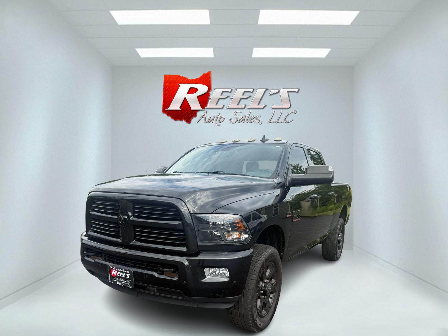 2017 Black /Black RAM 2500 Bighorn Crew Cab SWB 4WD (3C6UR5DJ8HG) with an 6.4L V8 engine, 6A transmission, located at 11115 Chardon Rd. , Chardon, OH, 44024, (440) 214-9705, 41.580246, -81.241943 - This 2017 Ram 2500 Big Horn Crew Cab with the 6.4L HEMI V8 and 6-speed automatic transmission is a powerful heavy-duty truck, boasting a 12,630-pound towing capacity and 3.73 gearing with a limited-slip rear differential for enhanced traction. It features a power driver’s seat, heated front seats, - Photo#0
