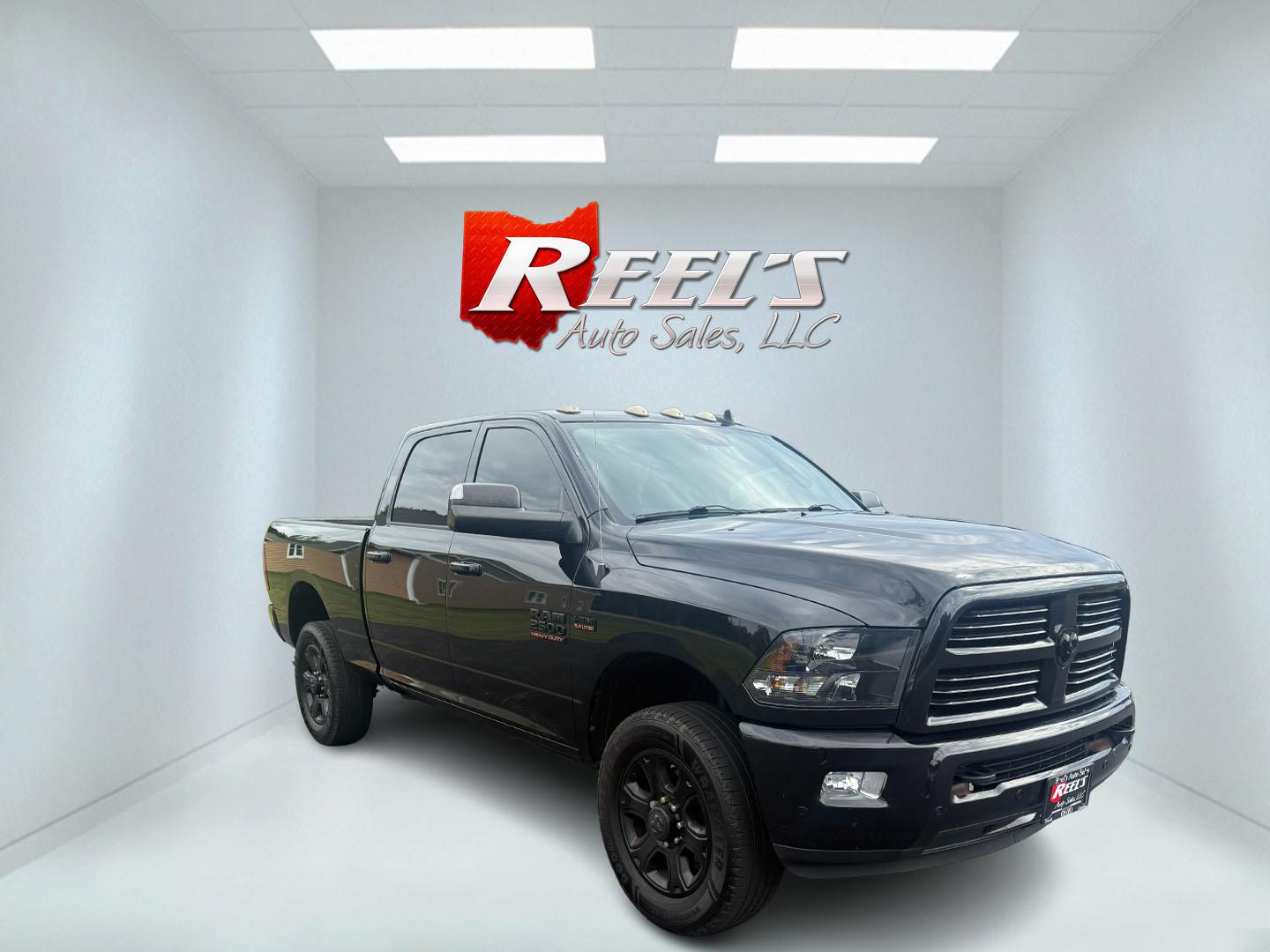 2017 Black /Black RAM 2500 Bighorn Crew Cab SWB 4WD (3C6UR5DJ8HG) with an 6.4L V8 engine, 6A transmission, located at 11115 Chardon Rd. , Chardon, OH, 44024, (440) 214-9705, 41.580246, -81.241943 - This 2017 Ram 2500 Big Horn Crew Cab with the 6.4L HEMI V8 and 6-speed automatic transmission is a powerful heavy-duty truck, boasting a 12,630-pound towing capacity and 3.73 gearing with a limited-slip rear differential for enhanced traction. It features a power driver’s seat, heated front seats, - Photo#2
