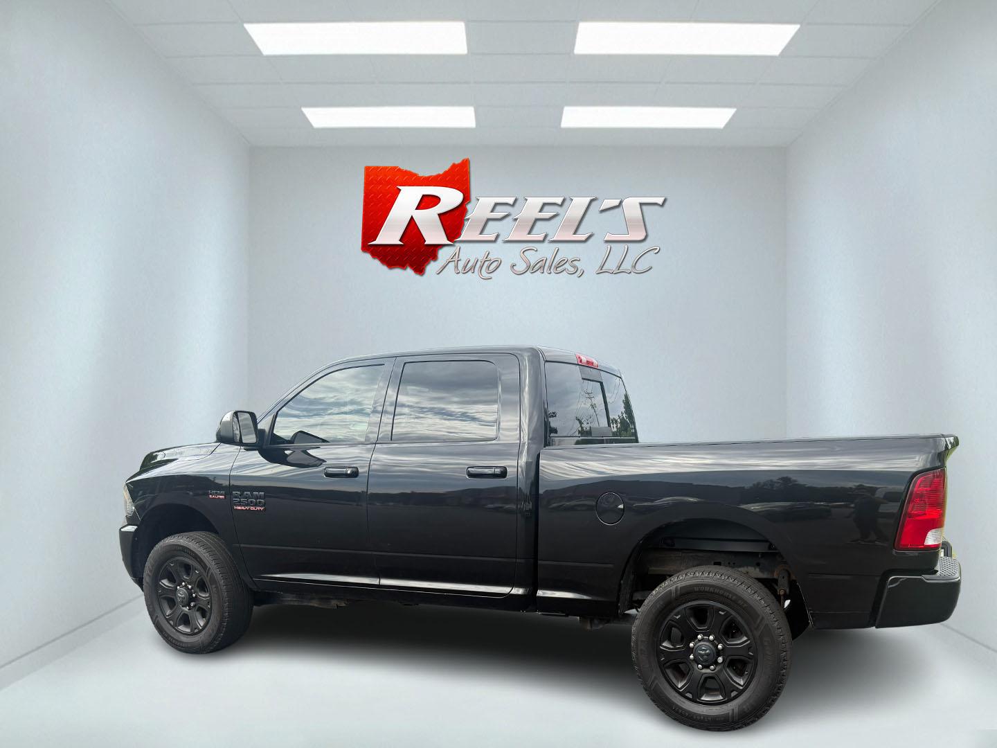 2017 Black /Black RAM 2500 Bighorn Crew Cab SWB 4WD (3C6UR5DJ8HG) with an 6.4L V8 engine, 6A transmission, located at 11115 Chardon Rd. , Chardon, OH, 44024, (440) 214-9705, 41.580246, -81.241943 - This 2017 Ram 2500 Big Horn Crew Cab with the 6.4L HEMI V8 and 6-speed automatic transmission is a powerful heavy-duty truck, boasting a 12,630-pound towing capacity and 3.73 gearing with a limited-slip rear differential for enhanced traction. It features a power driver’s seat, heated front seats, - Photo#45