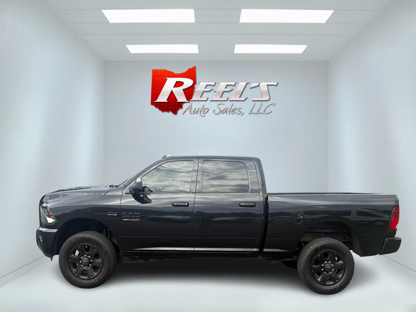 2017 Black /Black RAM 2500 Bighorn Crew Cab SWB 4WD (3C6UR5DJ8HG) with an 6.4L V8 engine, 6A transmission, located at 11115 Chardon Rd. , Chardon, OH, 44024, (440) 214-9705, 41.580246, -81.241943 - This 2017 Ram 2500 Big Horn Crew Cab with the 6.4L HEMI V8 and 6-speed automatic transmission is a powerful heavy-duty truck, boasting a 12,630-pound towing capacity and 3.73 gearing with a limited-slip rear differential for enhanced traction. It features a power driver’s seat, heated front seats, - Photo#46